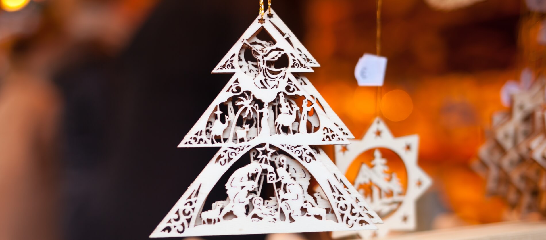 Wooden Christmas tree decorations which have been painted white
