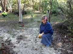 Image of a volunteer planting in Juniper Way Reserve