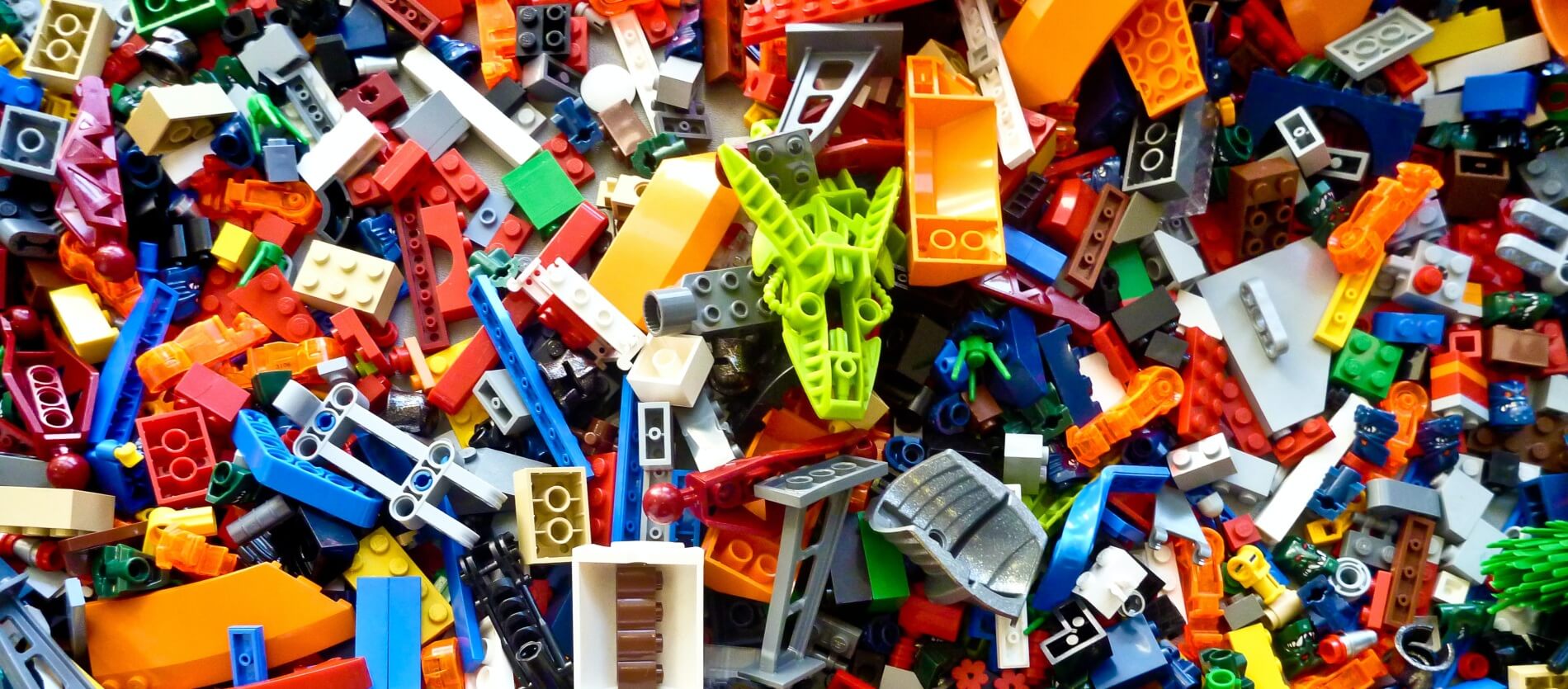 A pile of various loose lego pieces