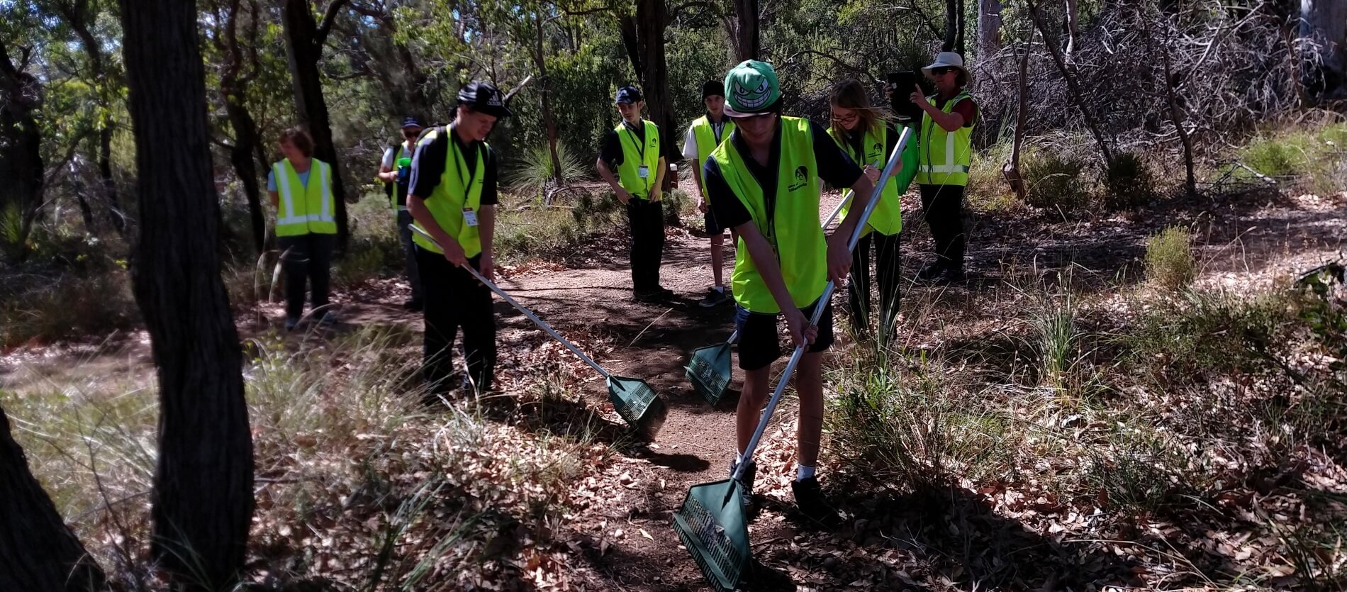 Students cleaning up on the Railway Heritage Trial