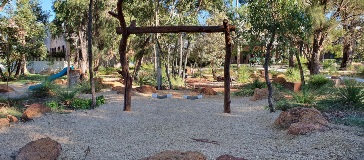 Swings at at Gladys Newton Park in High Wycombe