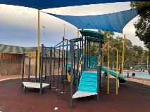 The playground area located at Ray Owen by the outdoor netball courts