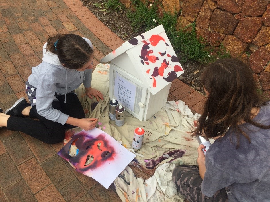 Youth - activities painting a library box